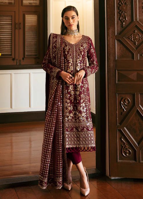 Model in Gulaal VALENTINA dress, maroon with gold embellishments, perfect for Pakistani clothes UK market.