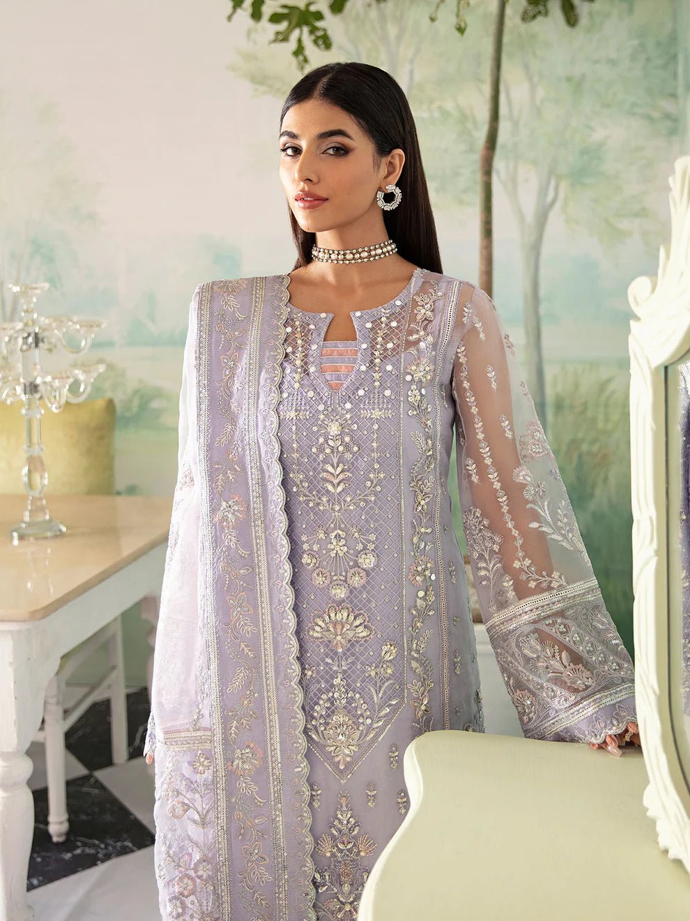 Model wearing a lavender Gulaal Liana GL - LP - V2 - 17 dress with intricate embroidery. Perfect for wedding occasions, highlighting Pakistani fashion online in the UK.