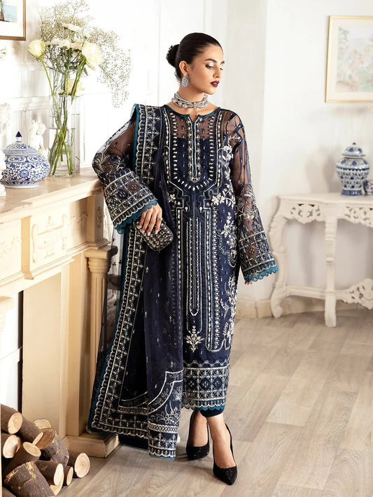 Model wearing a navy blue Sabela GL - LP - V2 - 15 dress from Gulaal. Highlighting intricate embroidery and luxurious design, available in the UK.