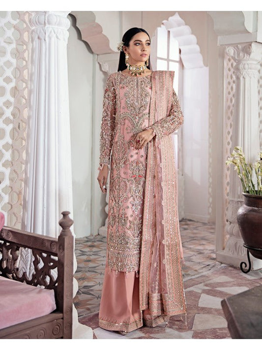 Model in Gulaal UK Arjumand, a blush embroidered net formal suit, from Meherma Wedding Formals.