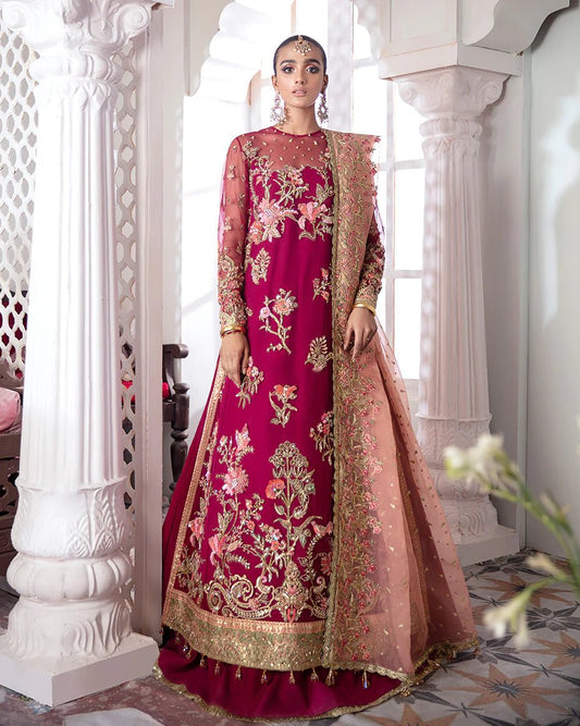 Model in Gulaal UK CHAMELI, magenta embroidered net formal suit, Meherma Wedding Formals.