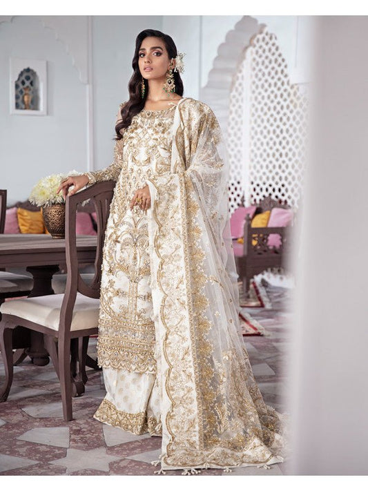 Model in Gulaal UK Shehnaz, luxurious gold embroidered net suit, Meherma Wedding Formals line.