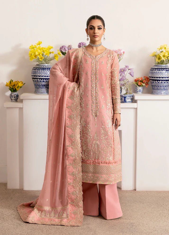 Model wearing Gulaal Coralyn blush pink embroidered chiffon dress with embellished dupatta. Shop Pakistani clothes online in the UK now.