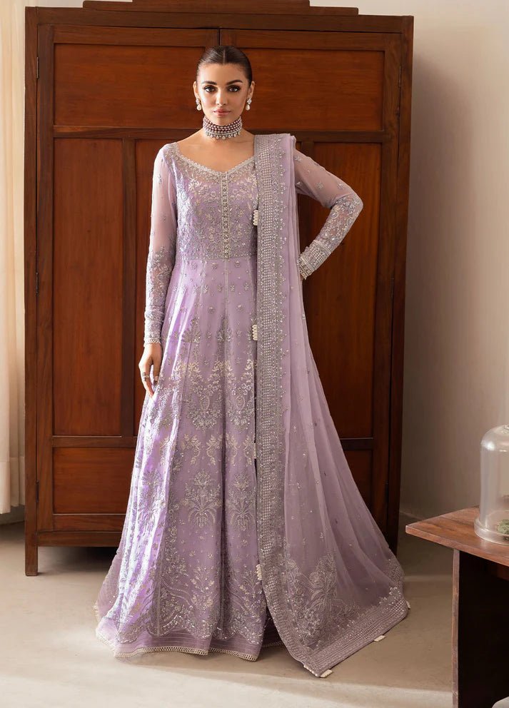 Model wearing Gulaal Pareesa pink lavender embroidered chiffon dress with embellished dupatta. Shop Pakistani clothes online in the UK now.