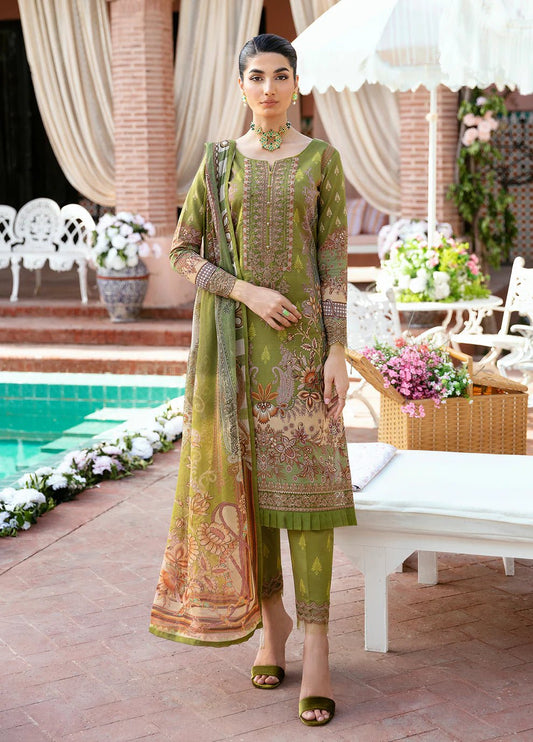 Model wearing Gulaal ALICIA dress, olive green with floral embroidery, Pakistani designer lawn suit in UK.