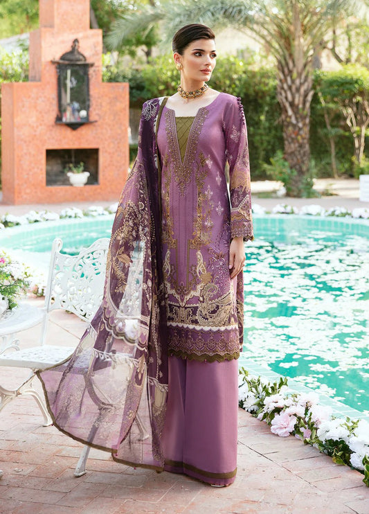 Model wearing Gulaal ESMERAY dress, mauve with gold embroidery, Pakistani designer lawn suit in UK.