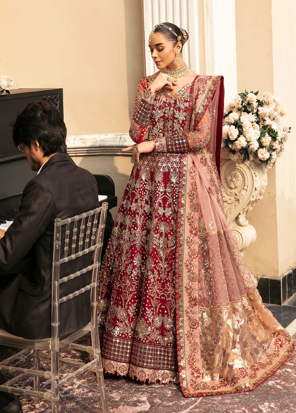 Model wearing Gulaal Unstitched Wedding Collection ZIVA GL-WU-23V1-02 lehnga choli in red hues, showcasing Pakistani clothes online in UK.