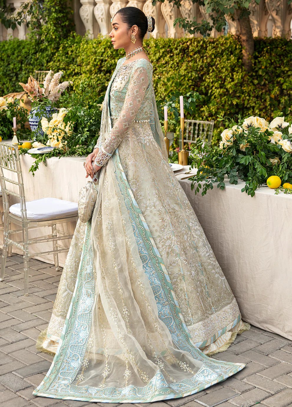 Model wearing Gulaal Unstitched Wedding Collection Nareena GL - WU - 23V1 - 06 pishwas in white and sky blue , showcasing Pakistani clothes online in UK.