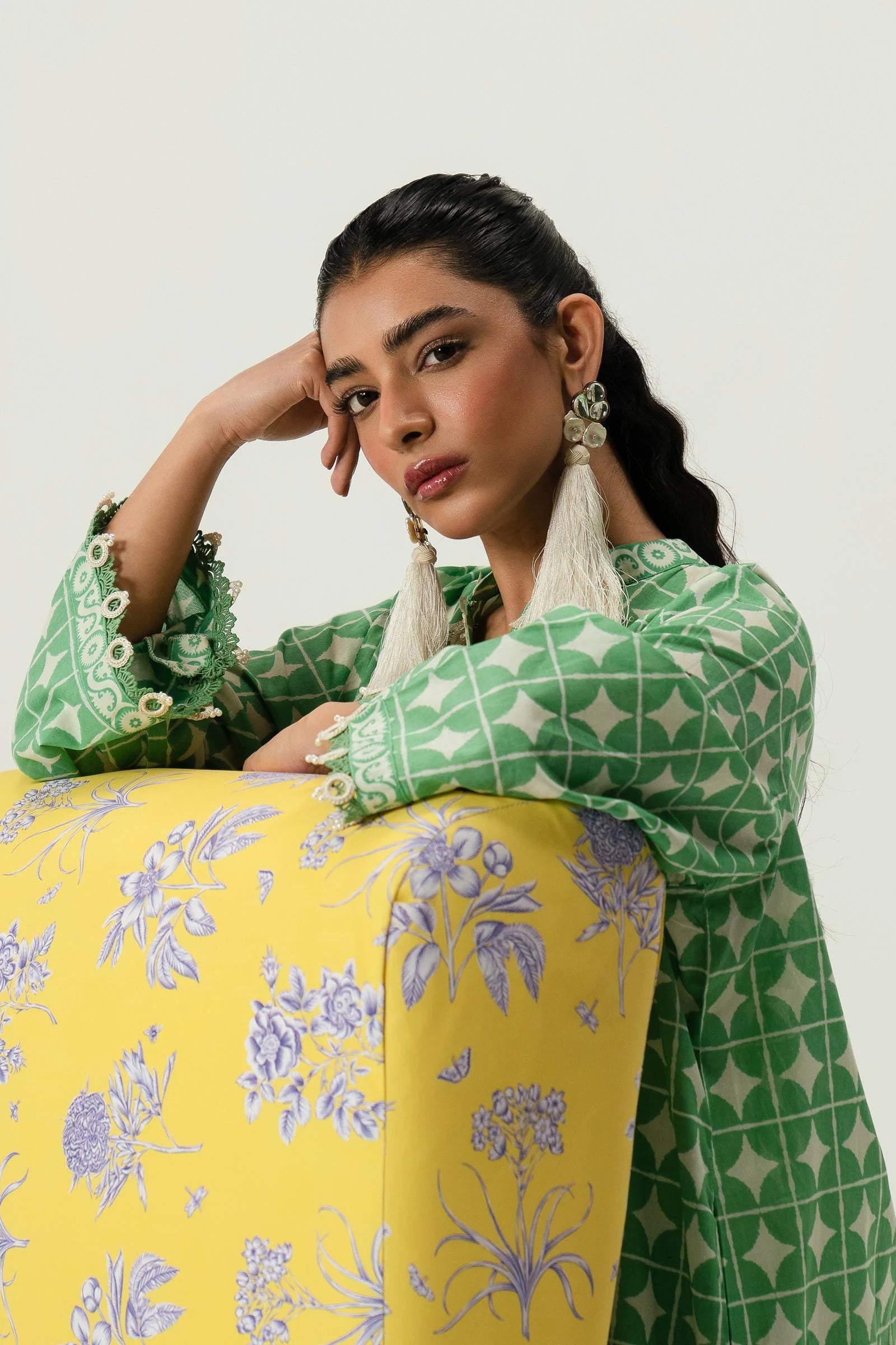 Model wearing Sana Safinaz Mahay'24 green geometric pattern lawn suit, fresh pakistani designer wear in UK.