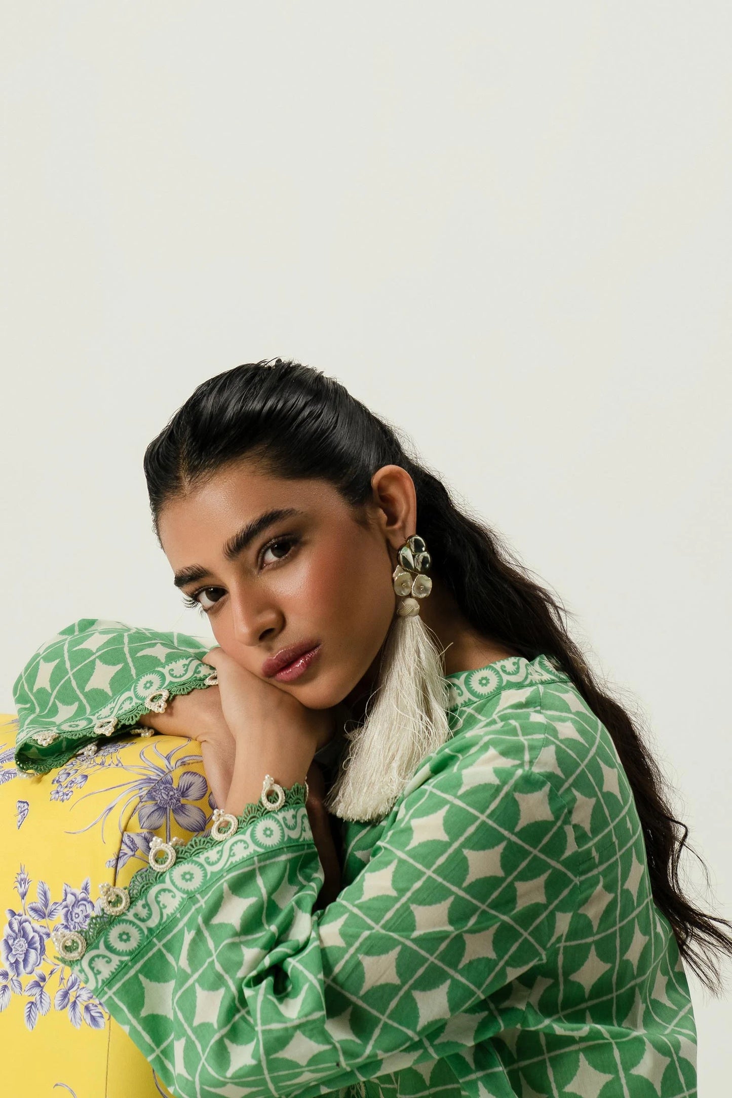 Model wearing Sana Safinaz Mahay'24 green geometric pattern lawn suit, fresh pakistani designer wear in UK.