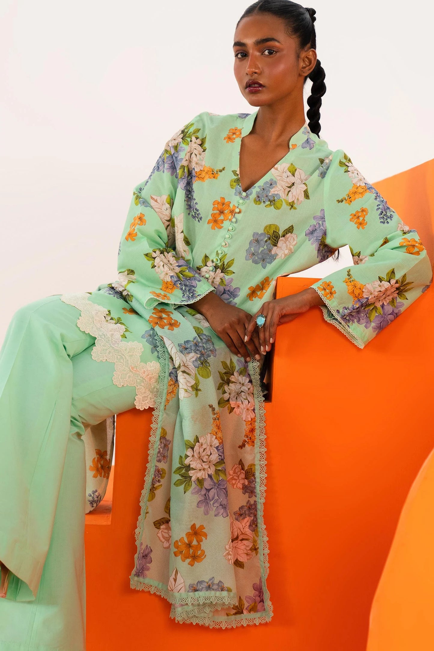 Model wearing Sana Safinaz Mahay'24 mint green floral lawn suit, refreshing designer collection in UK.