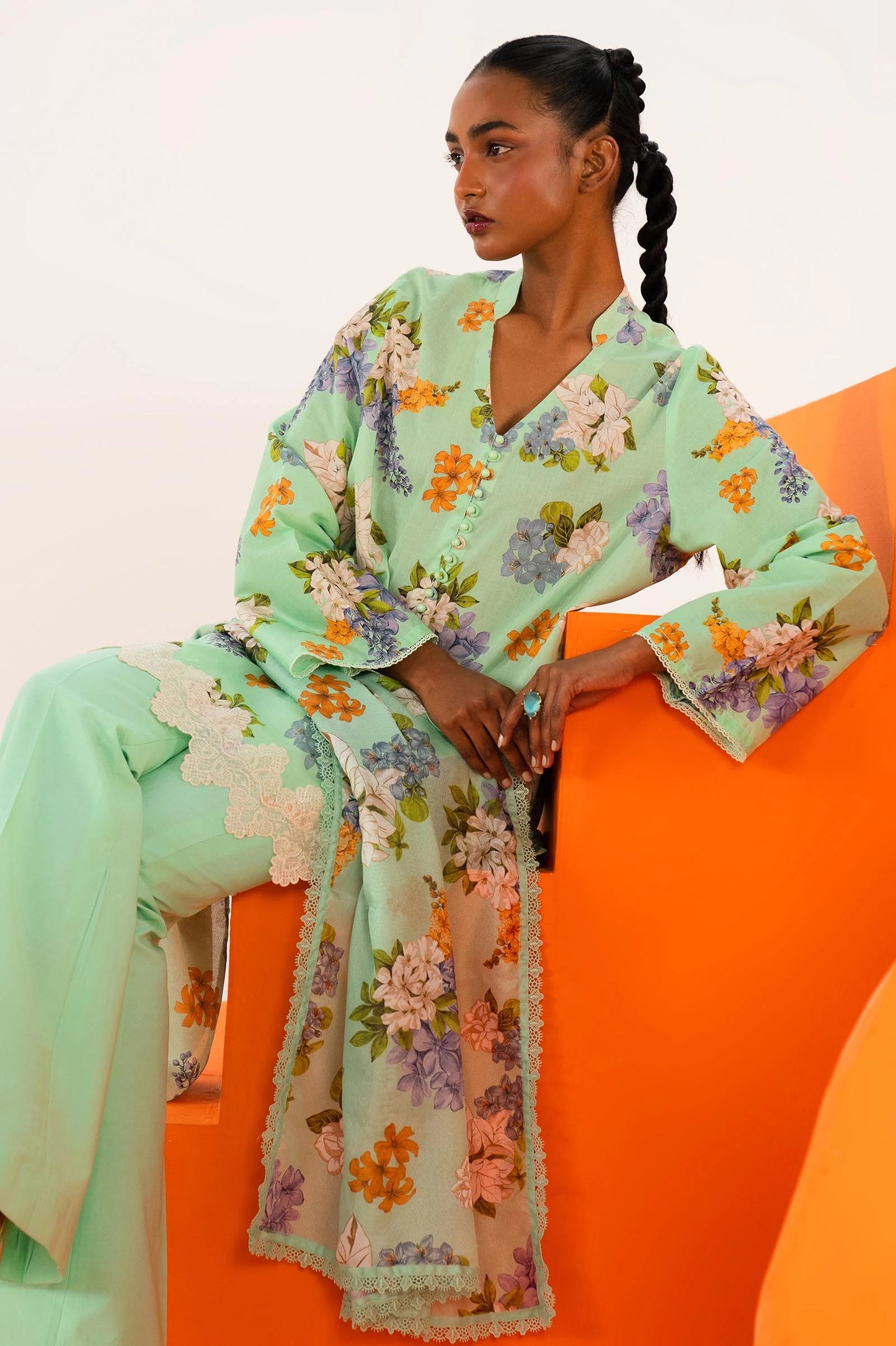 Model wearing Sana Safinaz Mahay'24 mint green floral lawn suit, refreshing designer collection in UK.