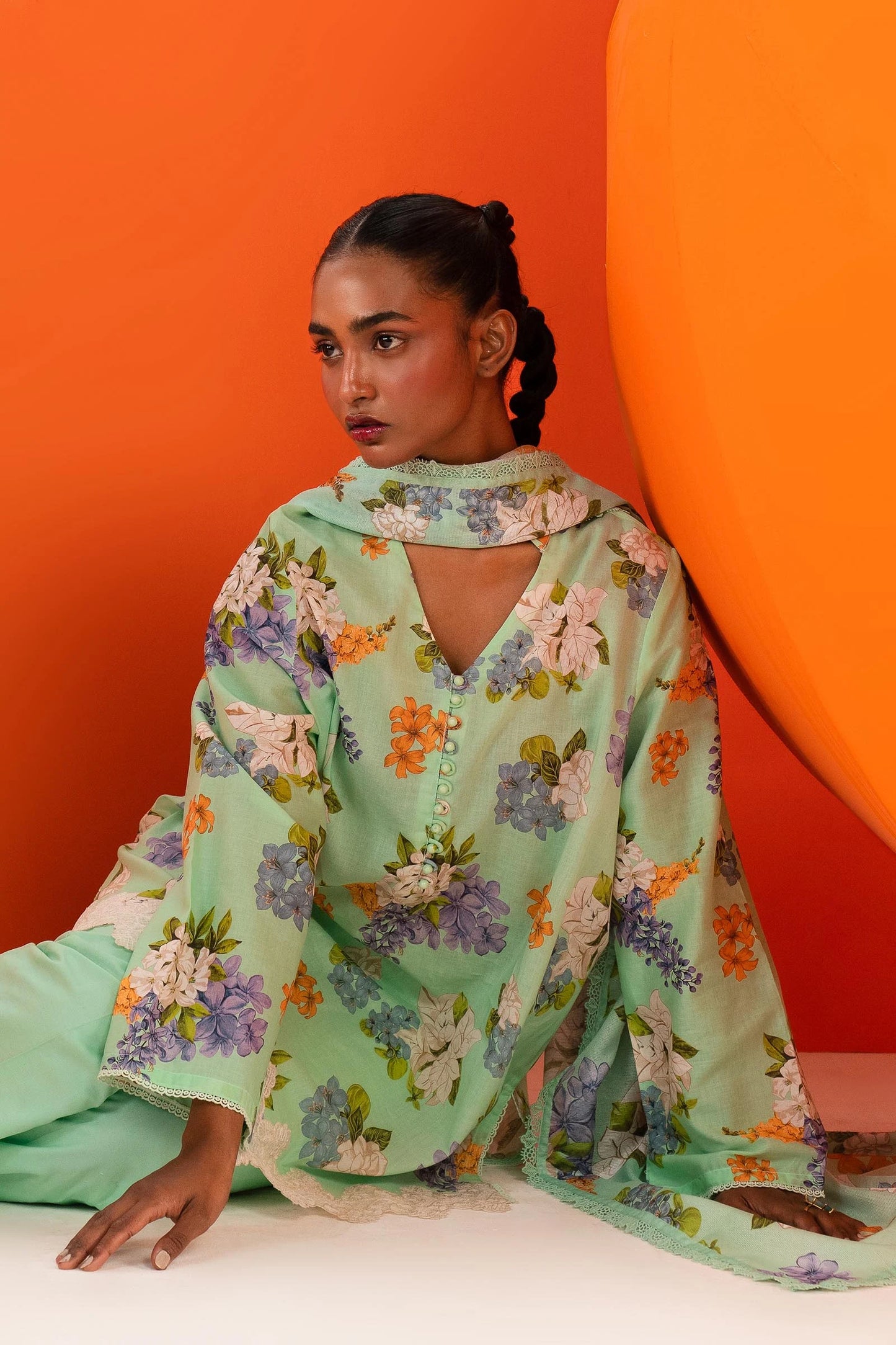 Model wearing Sana Safinaz Mahay'24 mint green floral lawn suit, refreshing designer collection in UK.