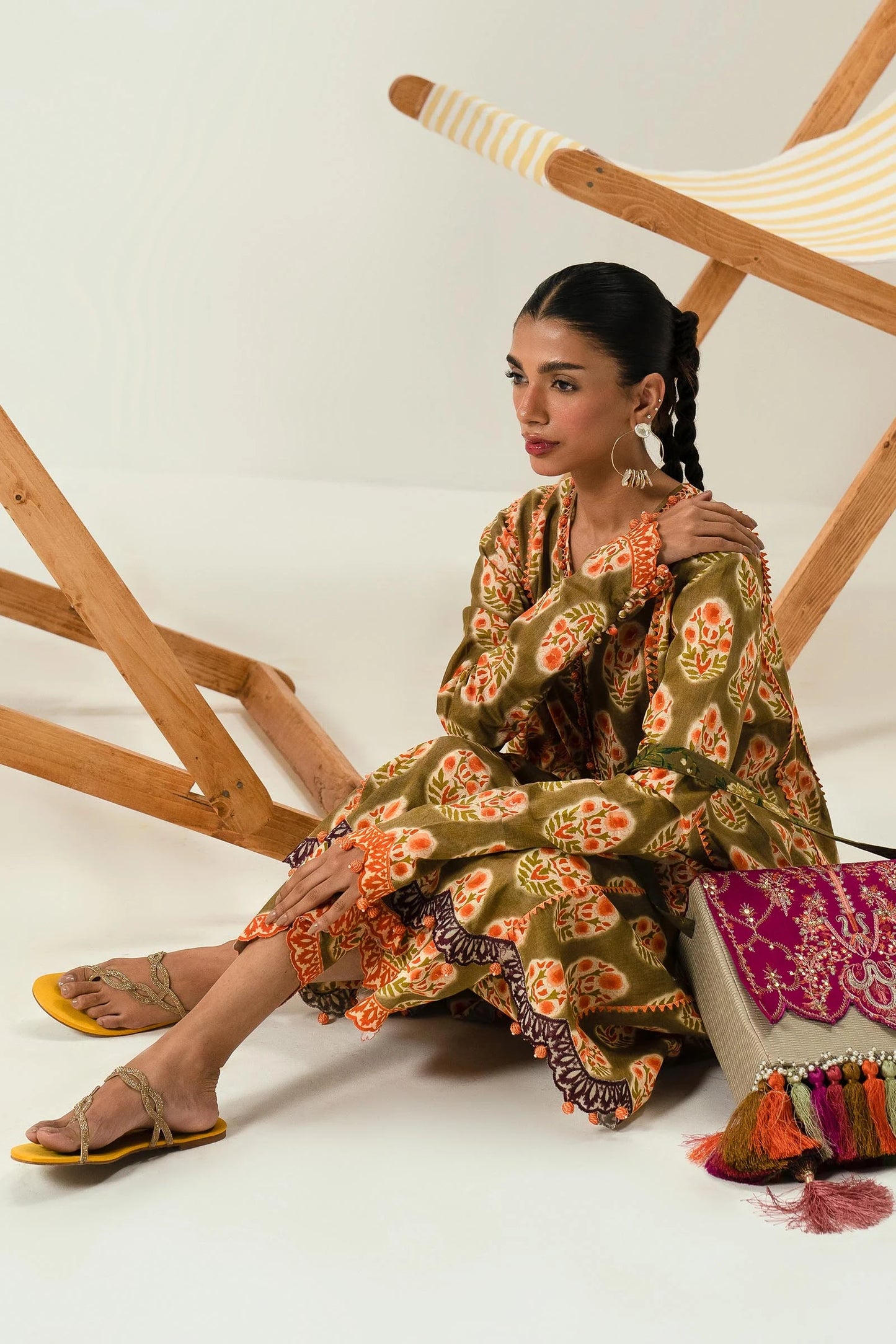 Model wearing Sana Safinaz H242 - 011B - 2AC olive green Pakistani lawn suit with vibrant dupatta.