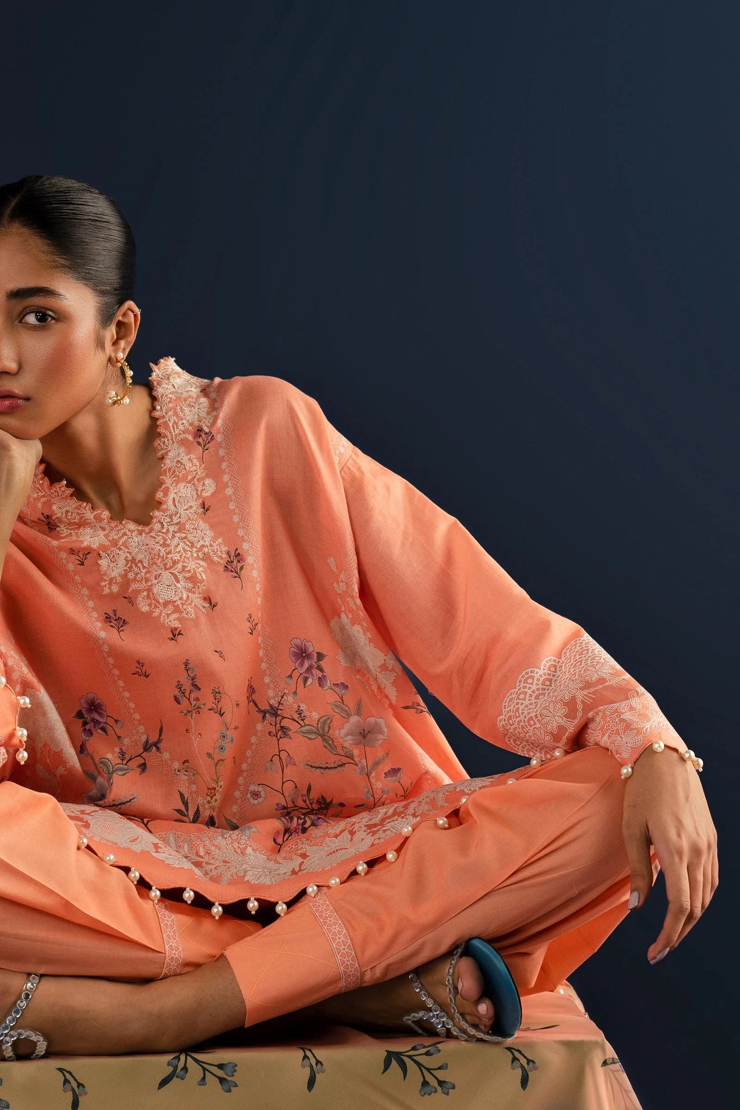 Model wearing Sana Safinaz H242 - 014A - 3CK peach embroidered Pakistani lawn suit.