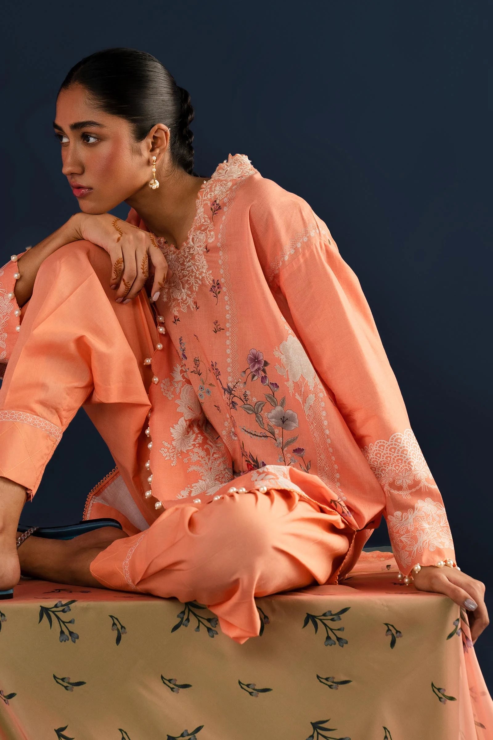 Model wearing Sana Safinaz H242 - 014A - 3CK peach embroidered Pakistani lawn suit.