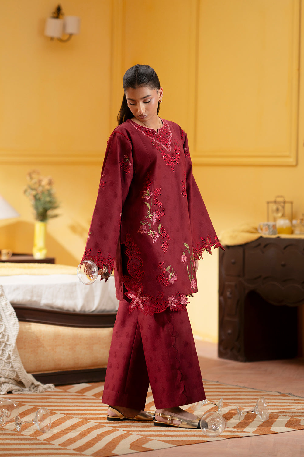 Model wearing deep red embroidered outfit from Saira Rizwan Joolie | JOOLIE RED - JBP25-09, Pakistani luxury pret available online in UK.