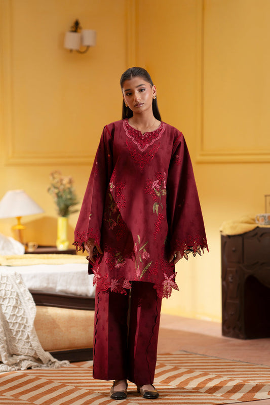Model wearing deep red embroidered outfit from Saira Rizwan Joolie | JOOLIE RED - JBP25-09, Pakistani luxury pret available online in UK.