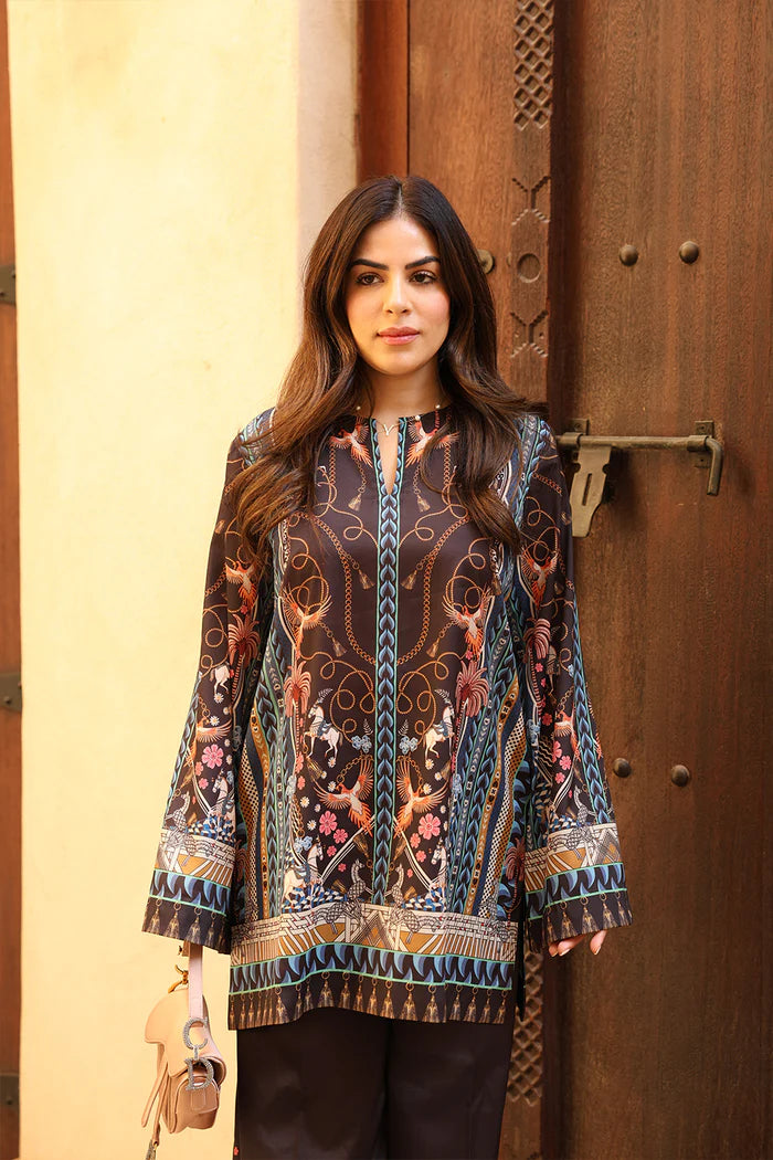 Model wearing black co-ord set with multicolour floral and geometric print from Saira Rizwan, Pakistani Luxury pret, Pakistani clothes online in UK.