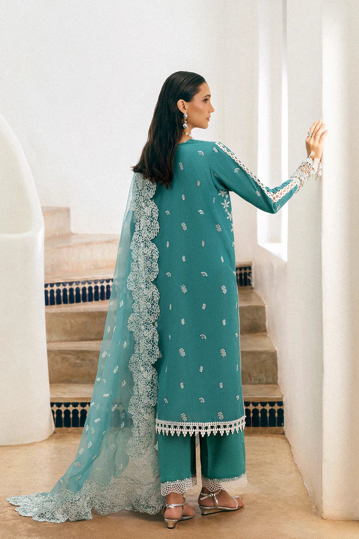 Model wearing teal Saira Rizwan REVE SREP05-25 from Sajri Eid Pret '25, Pakistani luxury pret outfit available online in UK.
