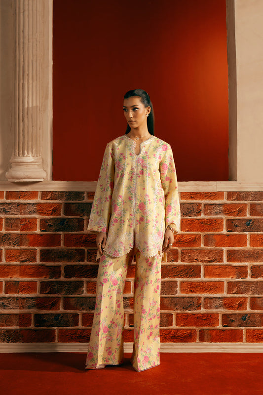 Model wearing yellow floral embroidered outfit from Saira Rizwan Joolie | YELLOW-JBP25-01, Pakistani luxury pret available online in UK.