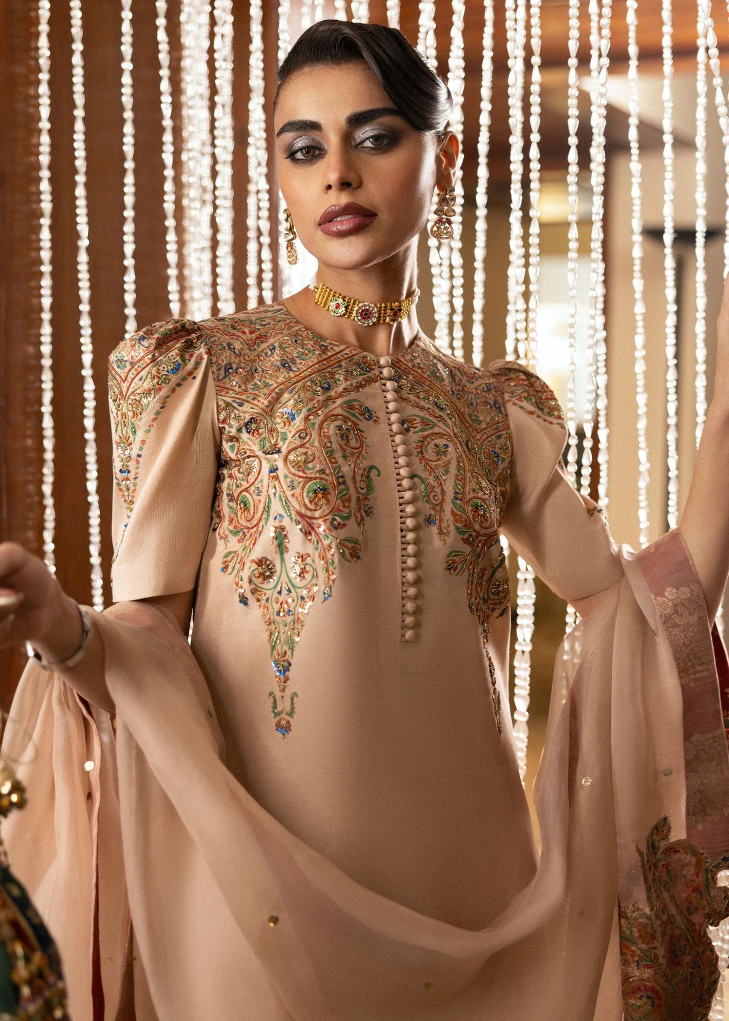 Model wearing Buff from Hussain Rehar's BASIC NOT BASIC V collection in a chic beige hue. Festive wear, Pakistani clothes online in UK.