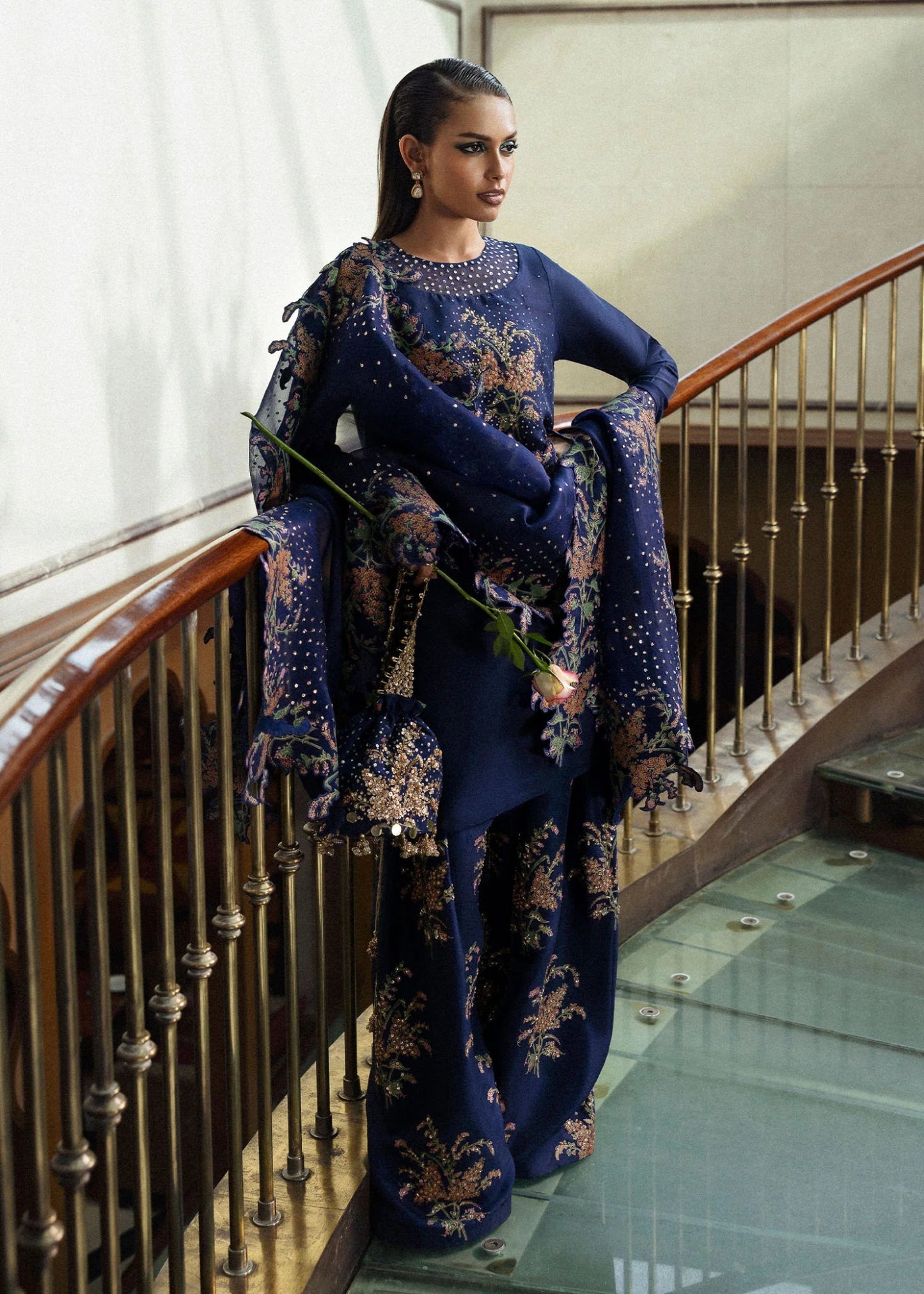 Model wearing Nocturne from Hussain Rehar's BASIC NOT BASIC V collection in deep navy. Festive wear, Pakistani clothes online in UK.