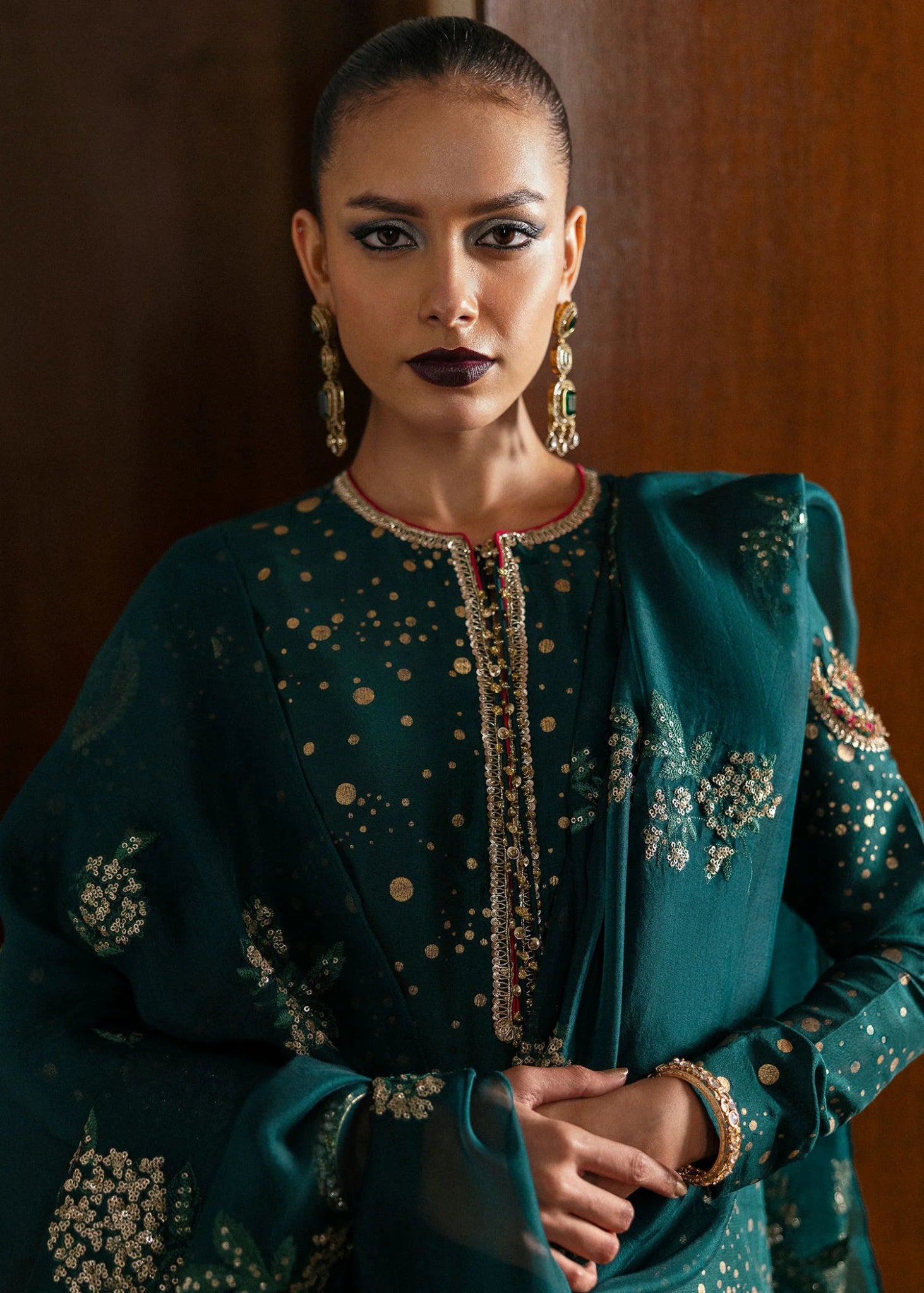 Model wearing Verdure from Hussain Rehar's BASIC NOT BASIC V collection in vibrant green tones. Pakistani clothes online in UK at Signature Labels.