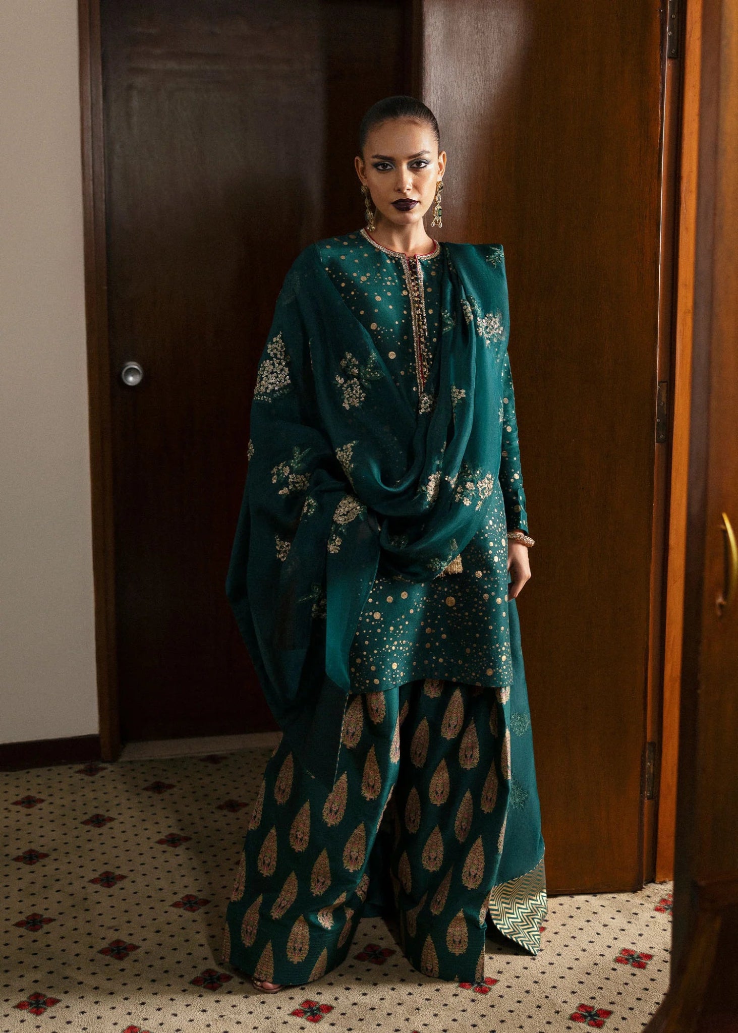 Model wearing Verdure from Hussain Rehar's BASIC NOT BASIC V collection in vibrant green tones. Pakistani clothes online in UK at Signature Labels.