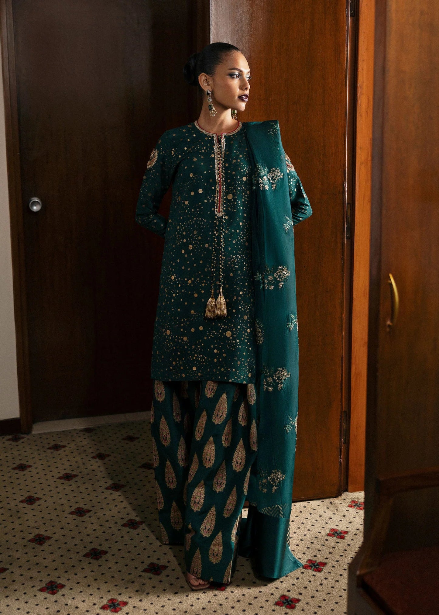 Model wearing Verdure from Hussain Rehar's BASIC NOT BASIC V collection in vibrant green tones. Pakistani clothes online in UK at Signature Labels.