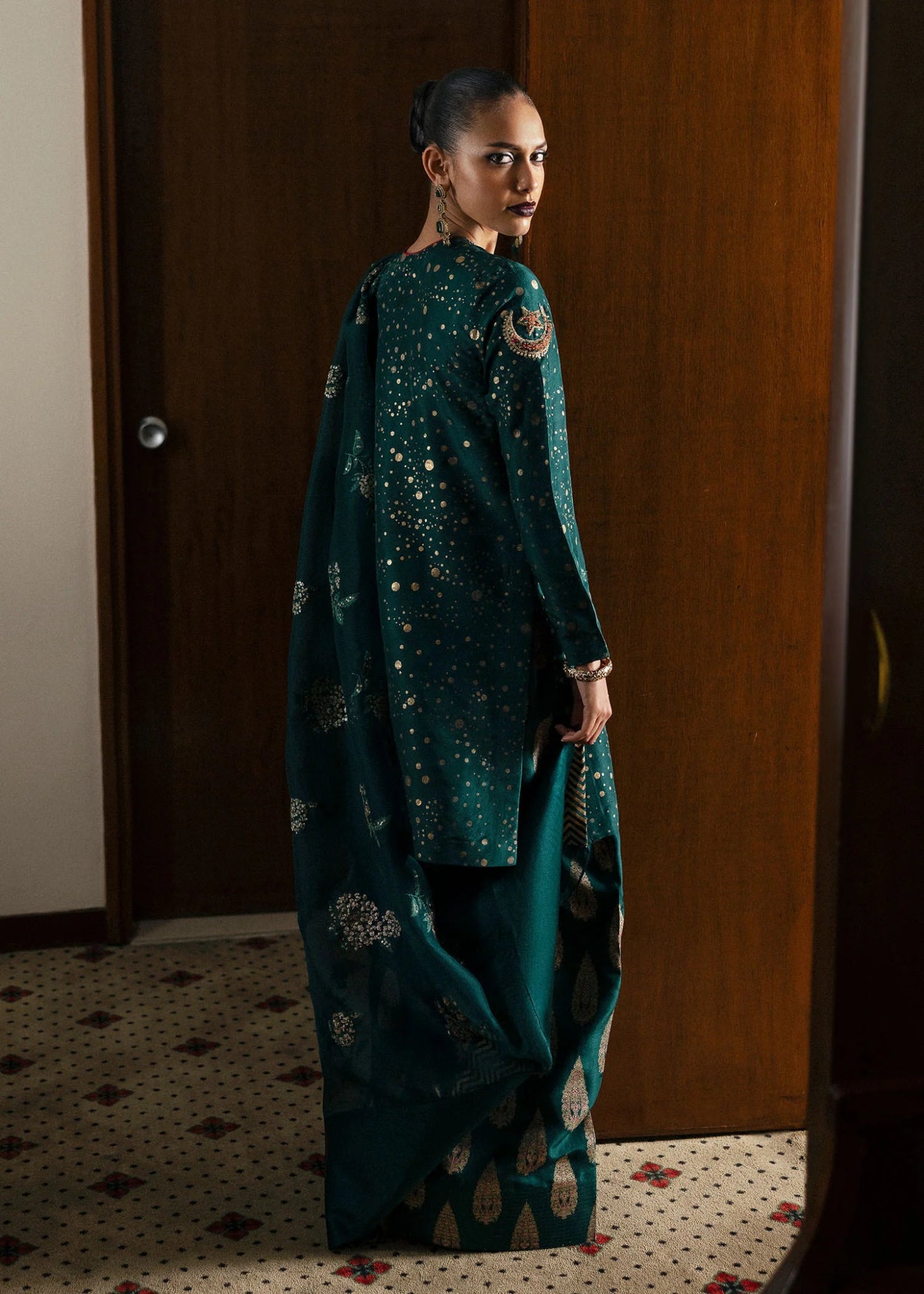 Model wearing Verdure from Hussain Rehar's BASIC NOT BASIC V collection in vibrant green tones. Pakistani clothes online in UK at Signature Labels.