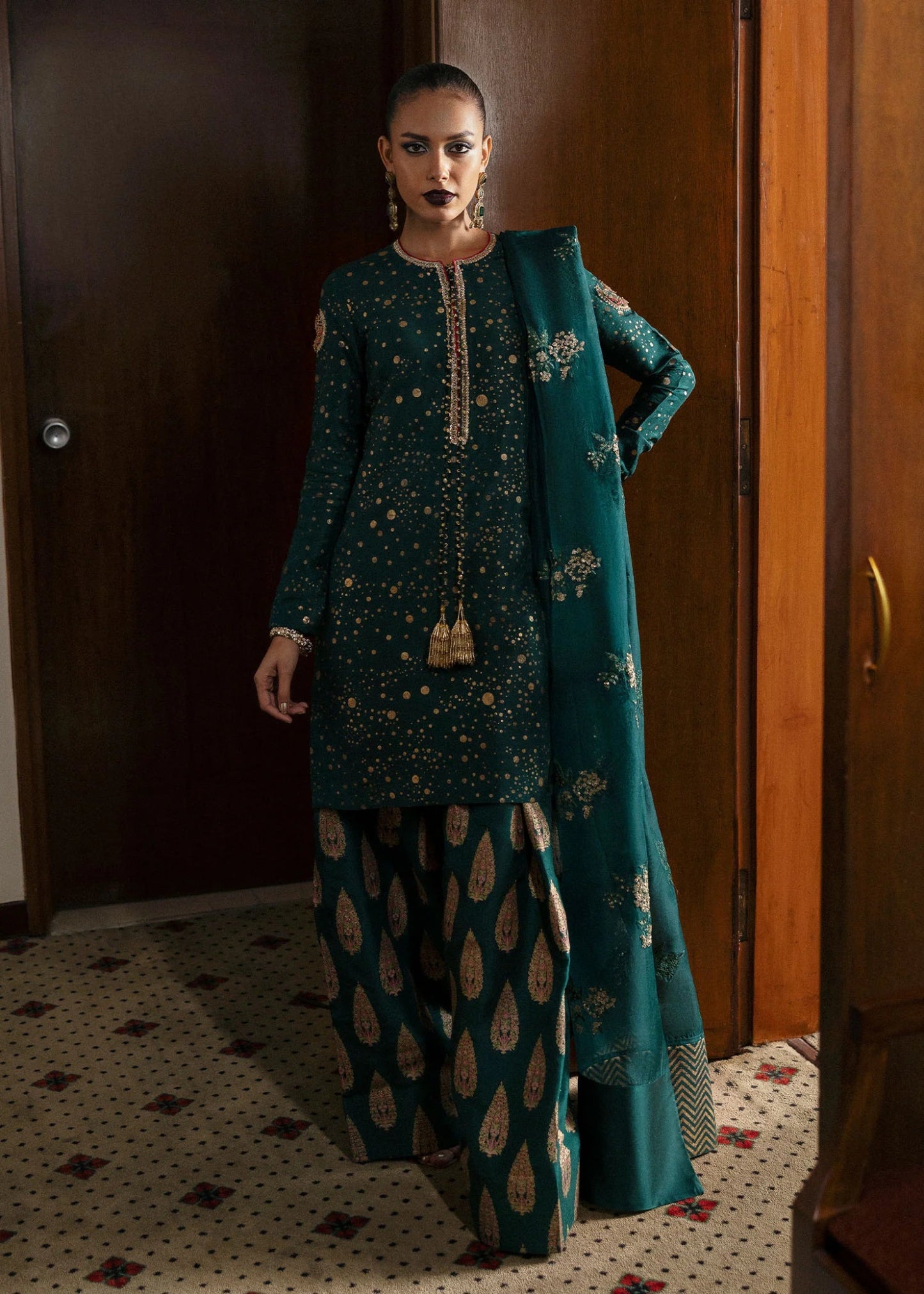 Model wearing Verdure from Hussain Rehar's BASIC NOT BASIC V collection in vibrant green tones. Pakistani clothes online in UK at Signature Labels.