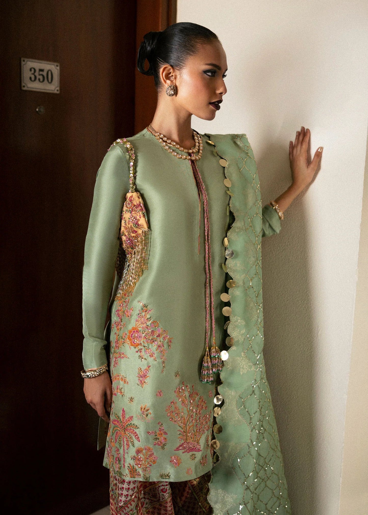 Model wearing Viridity from Hussain Rehar's BASIC NOT BASIC V collection in rich green. Festive wear, Pakistani clothes online in UK.