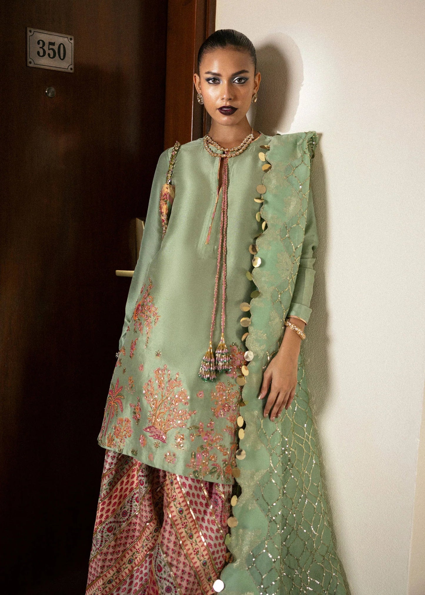 Model wearing Viridity from Hussain Rehar's BASIC NOT BASIC V collection in rich green. Festive wear, Pakistani clothes online in UK.