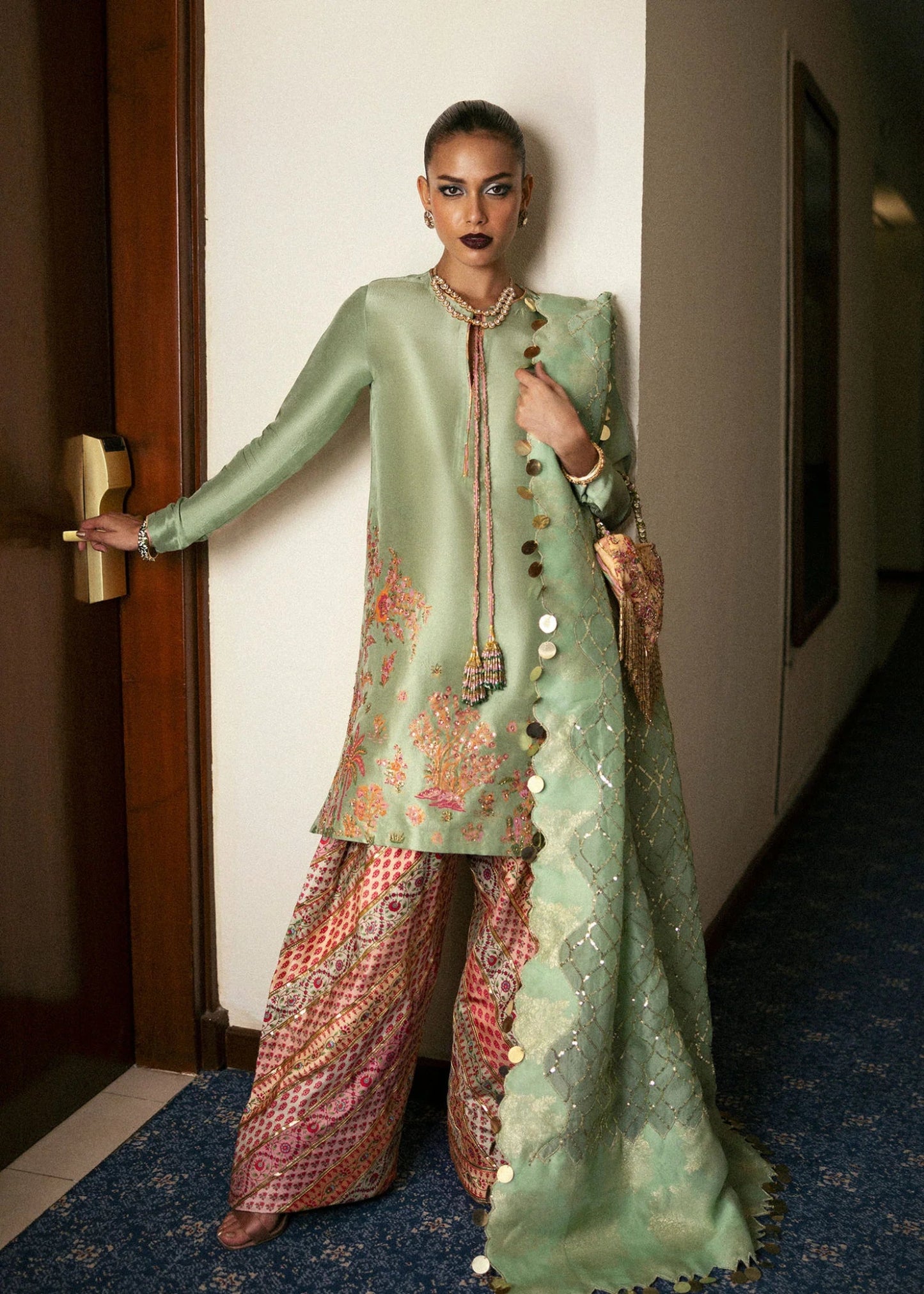 Model wearing Viridity from Hussain Rehar's BASIC NOT BASIC V collection in rich green. Festive wear, Pakistani clothes online in UK.