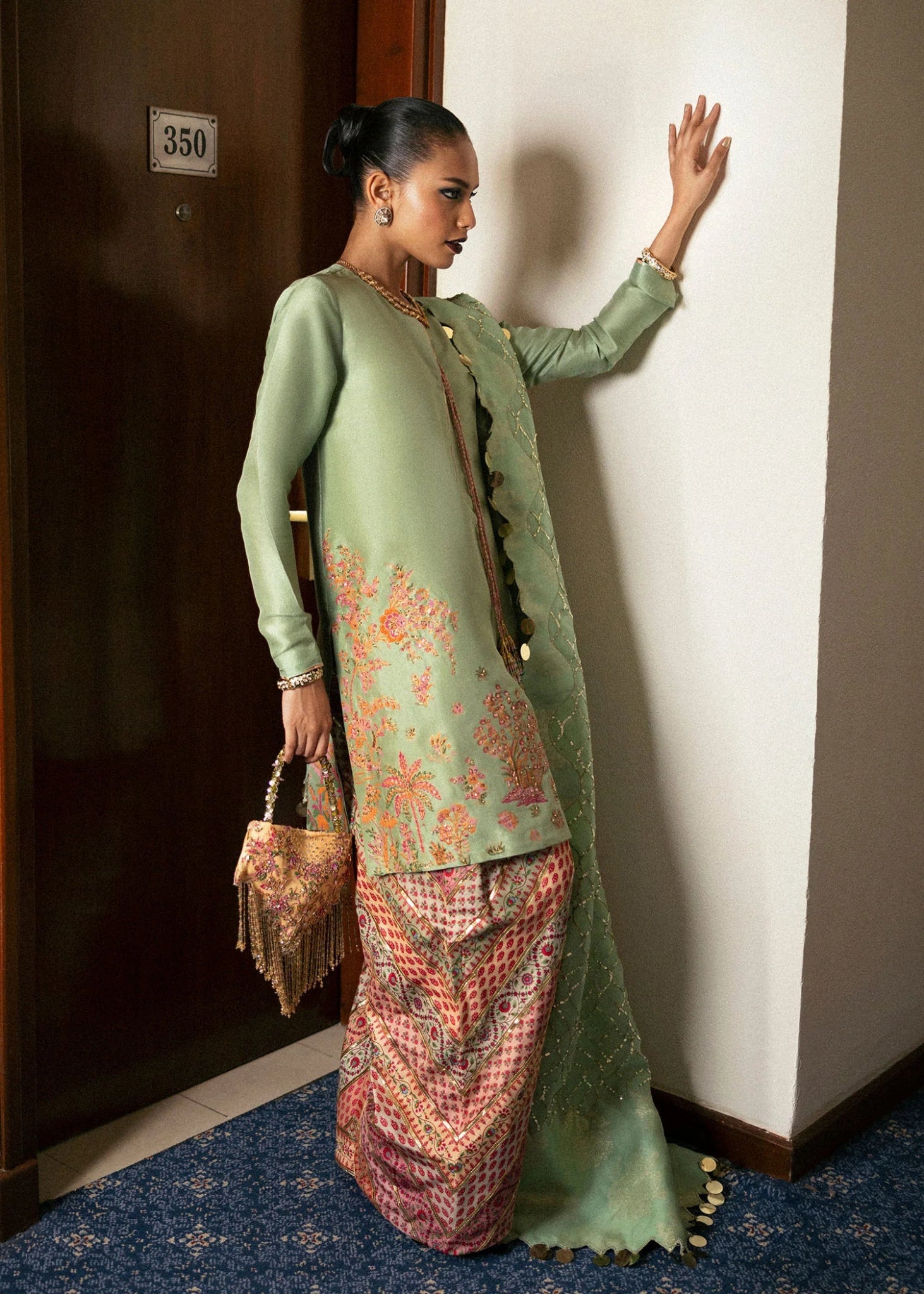 Model wearing Viridity from Hussain Rehar's BASIC NOT BASIC V collection in rich green. Festive wear, Pakistani clothes online in UK.