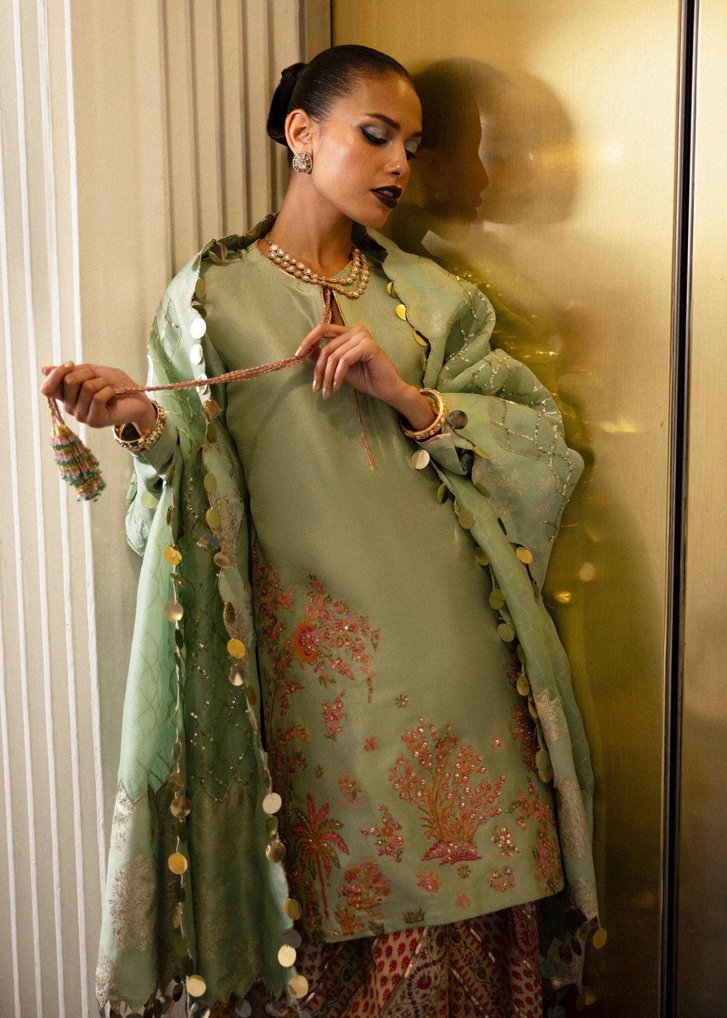 Model wearing Viridity from Hussain Rehar's BASIC NOT BASIC V collection in rich green. Festive wear, Pakistani clothes online in UK.