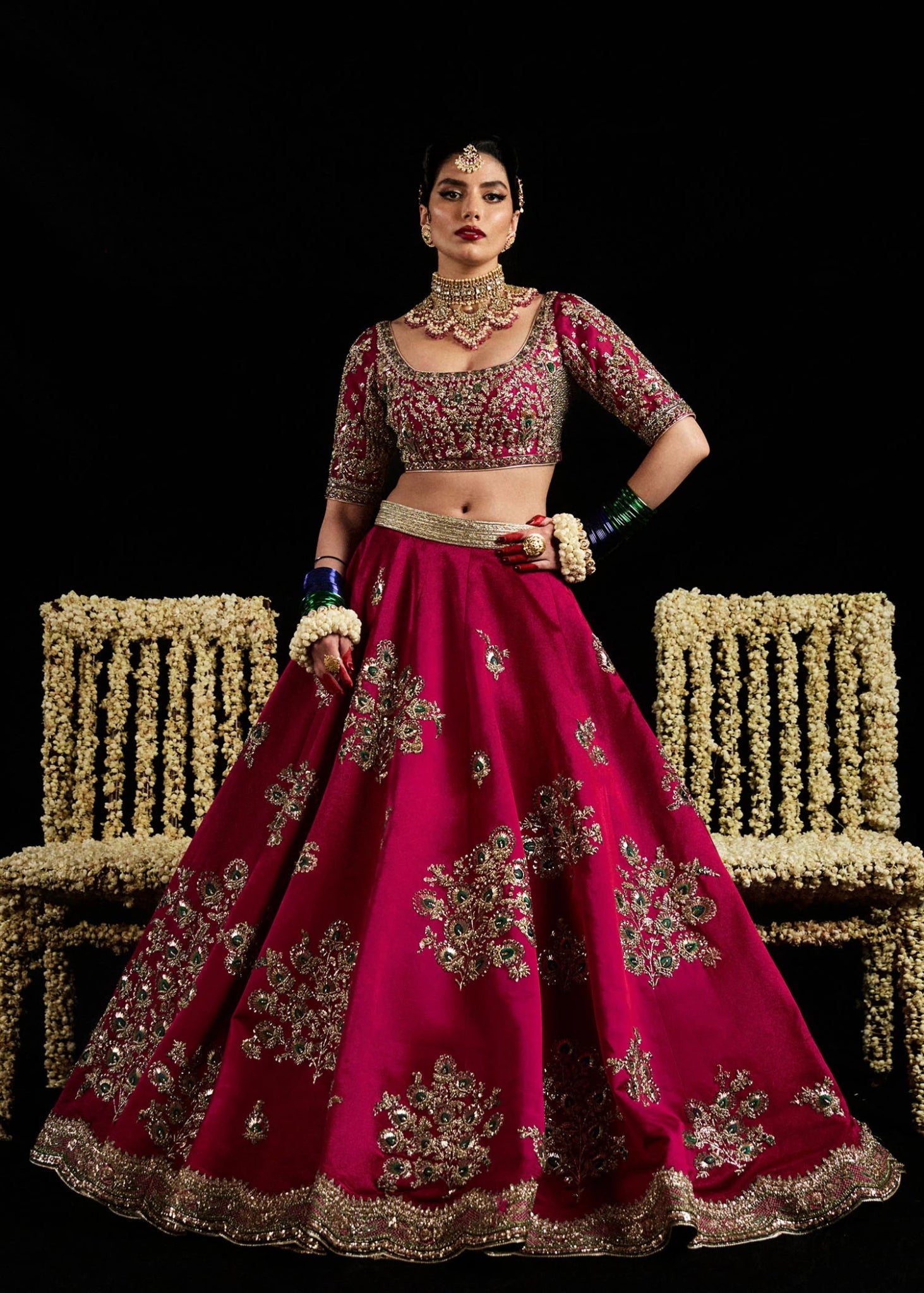 Model wearing Laal from Hussain Rehar's Bridal Couture '24, featuring intricate bridal design. Pakistani clothes online in UK.