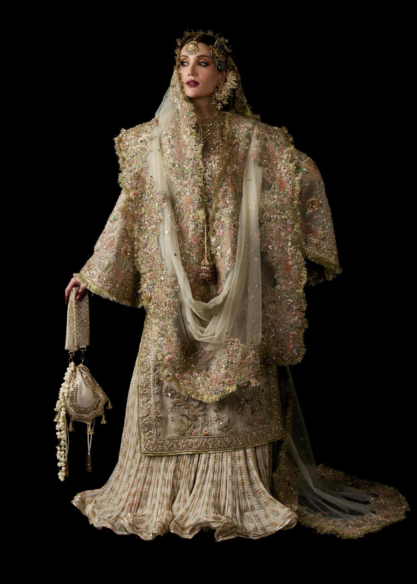 Model wearing Mahtabi from Hussain Rehar's Bridal Couture '24, showcasing luxurious bridal design. Pakistani clothes online in UK, Luxury Pret.