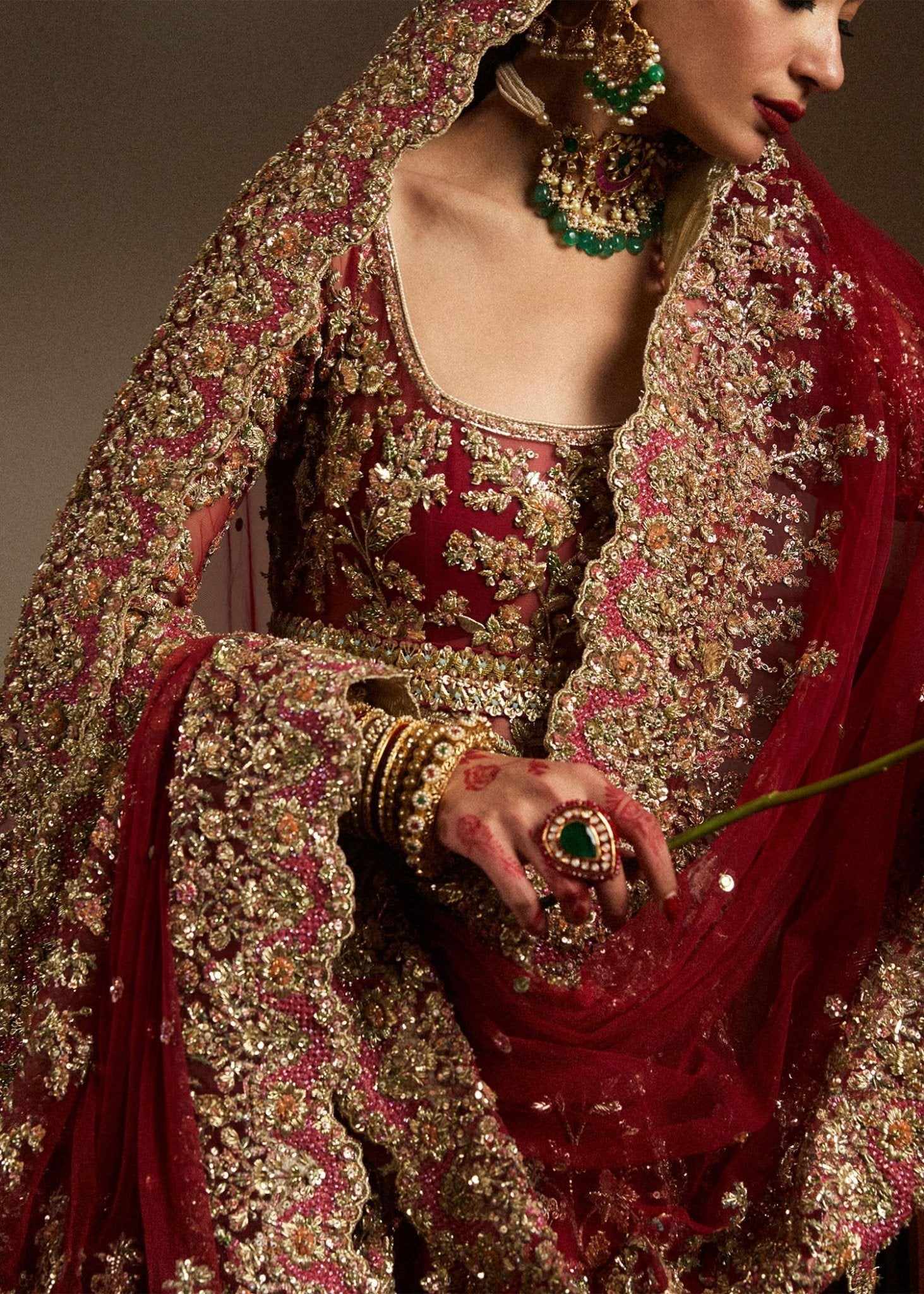 Model wearing Qashqaye from Hussain Rehar's Bridal Couture '24, exuding luxury and elegance. Pakistani clothes online in UK.