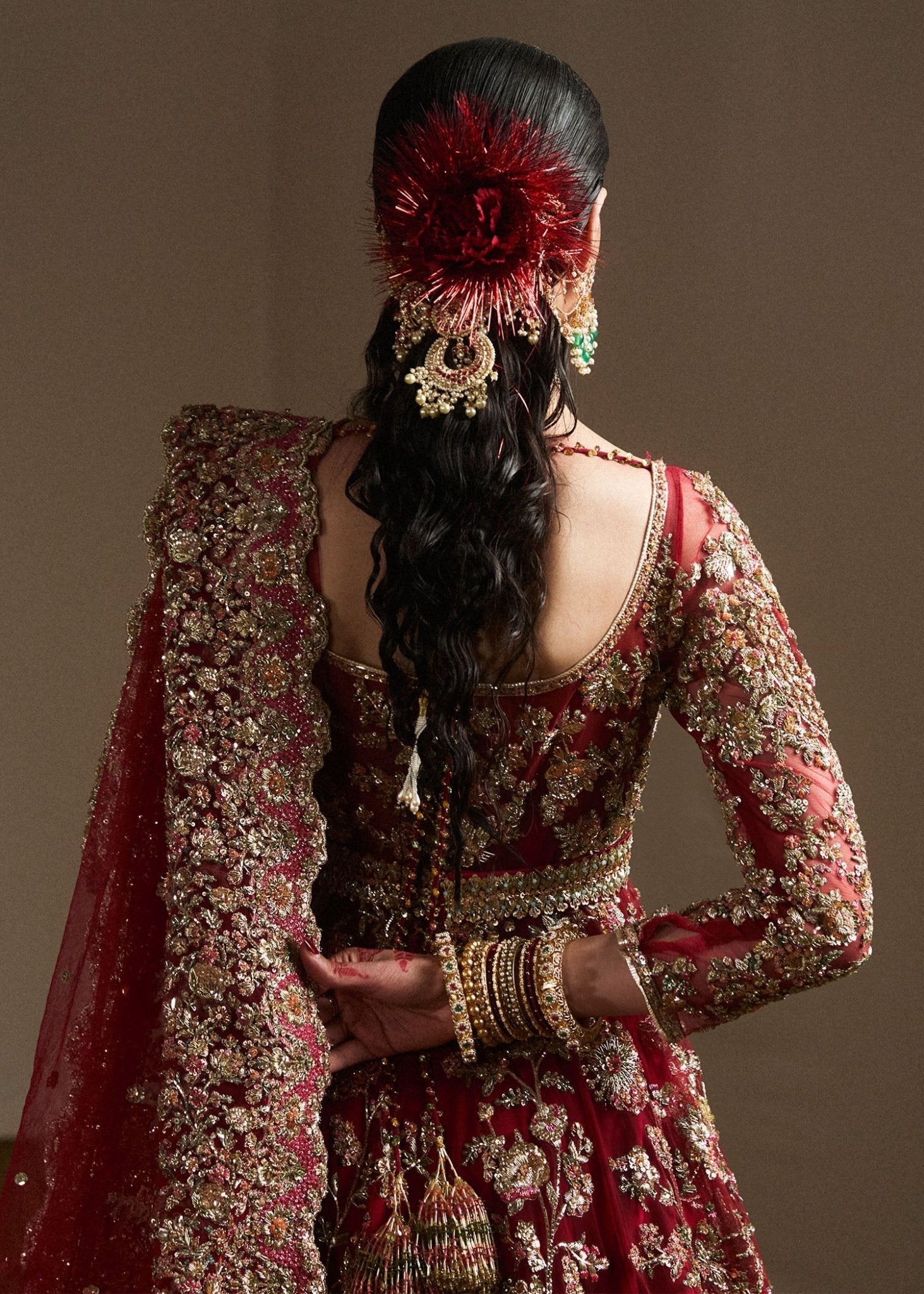 Model wearing Qashqaye from Hussain Rehar's Bridal Couture '24, exuding luxury and elegance. Pakistani clothes online in UK.