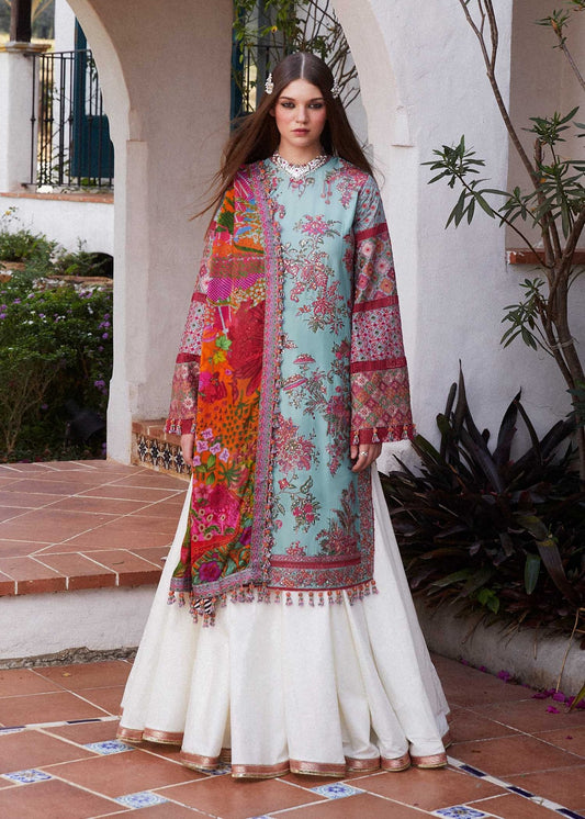 Model wearing Hussain Rehar FLORET aqua floral dress, Pakistani Eid lawn SS/24 in UK.