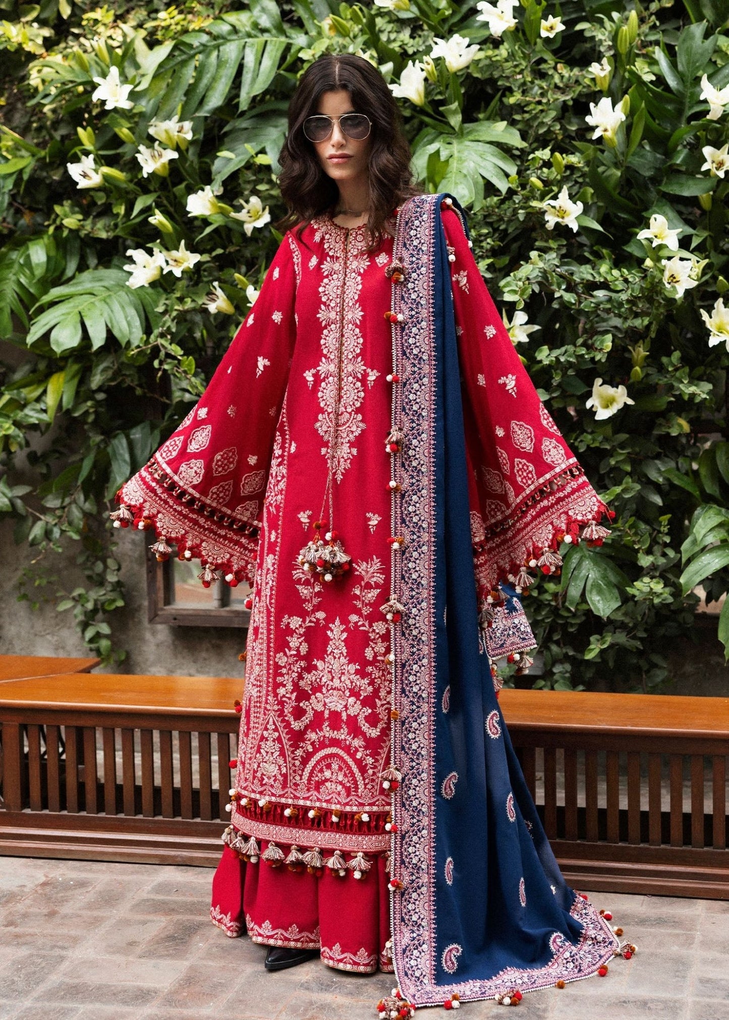 Model wearing Aman from Hussain Rehar's Karandi AW '24 collection, featuring elegant designs. Luxury Pakistani clothes online in UK.