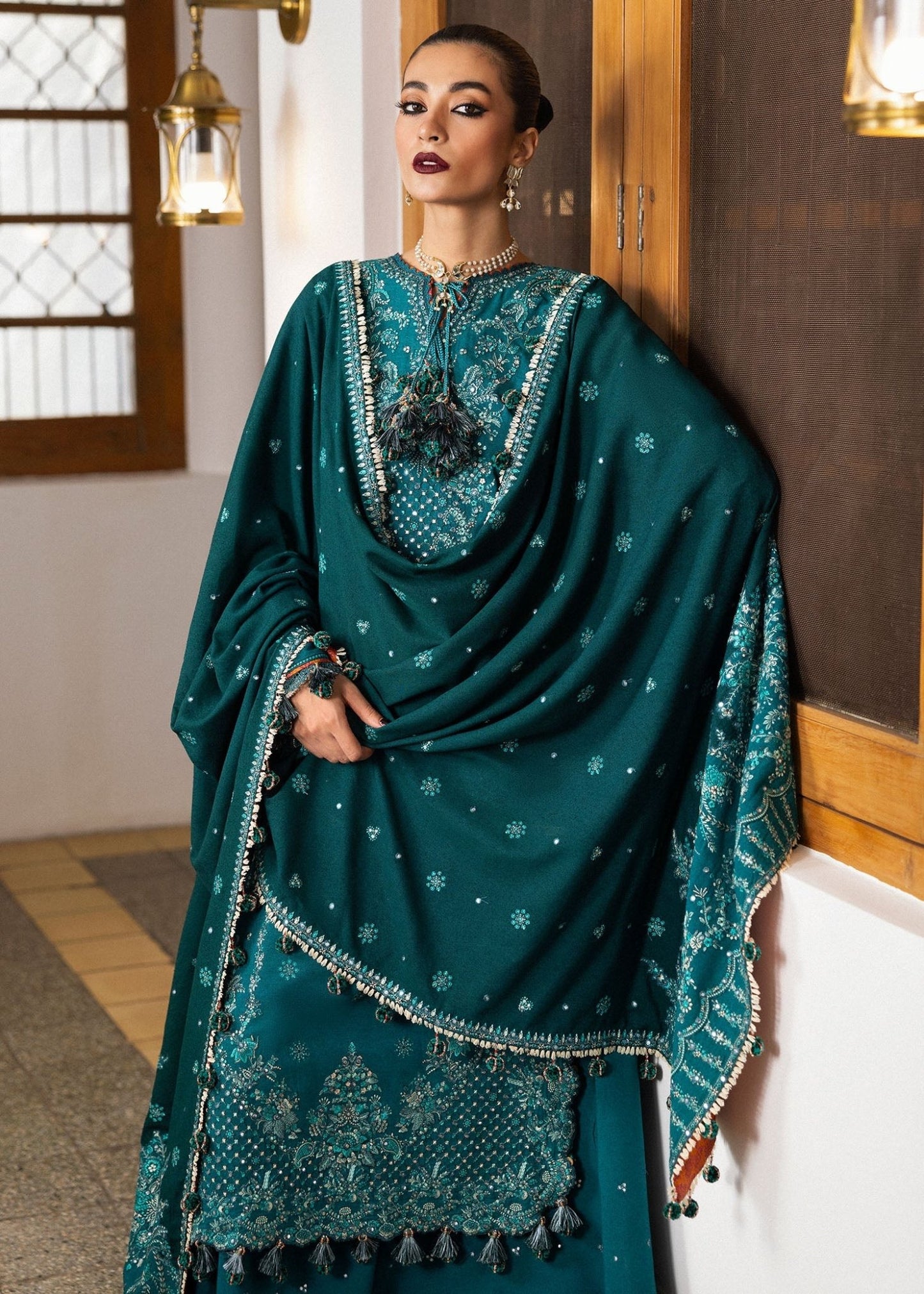 Model wearing Durk from Hussain Rehar's Karandi AW '24, showcasing luxury Pakistani clothes online in UK.