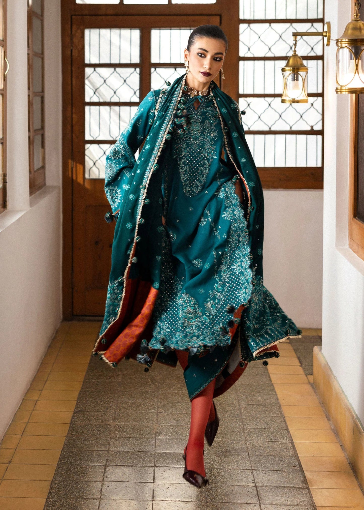 Model wearing Durk from Hussain Rehar's Karandi AW '24, showcasing luxury Pakistani clothes online in UK.