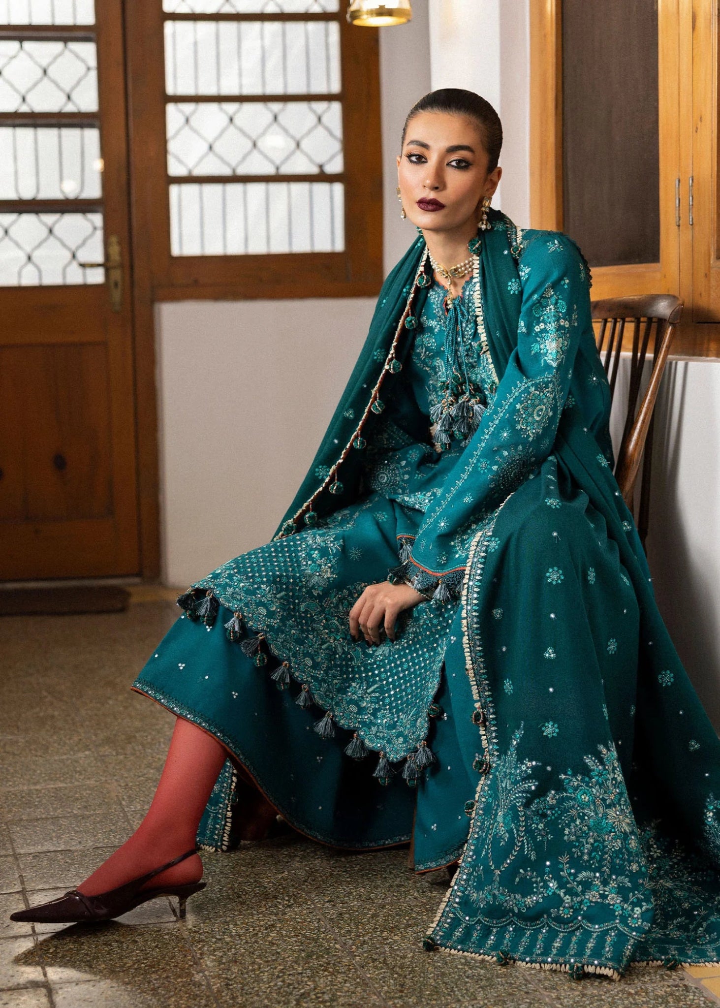 Model wearing Durk from Hussain Rehar's Karandi AW '24, showcasing luxury Pakistani clothes online in UK.