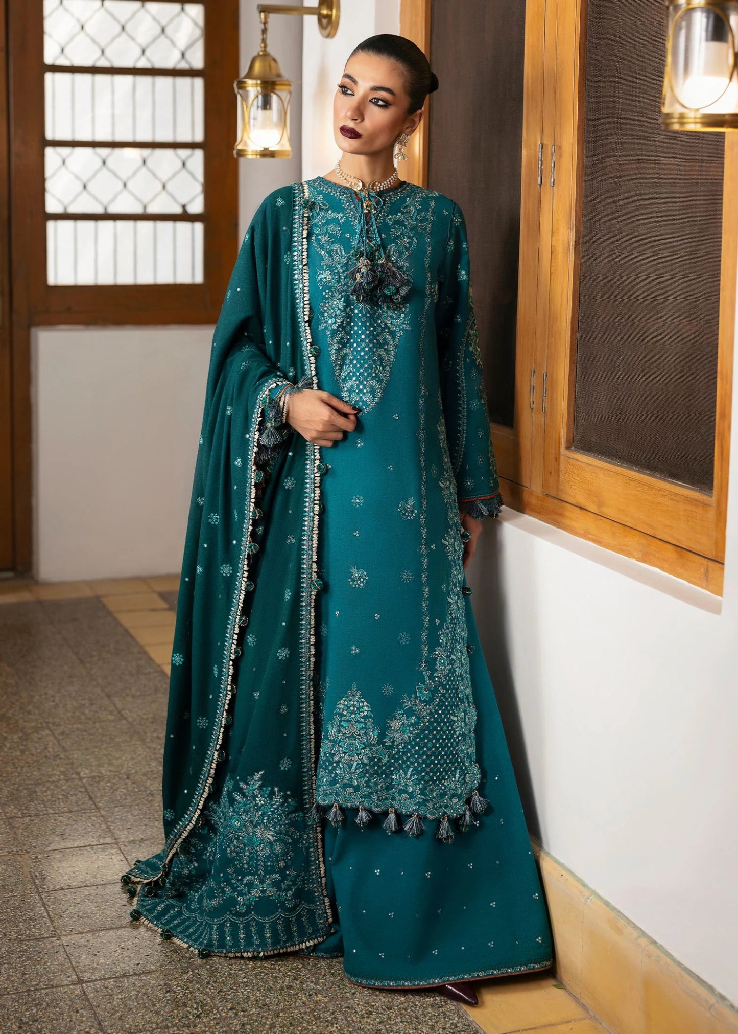 Model wearing Durk from Hussain Rehar's Karandi AW '24, showcasing luxury Pakistani clothes online in UK.