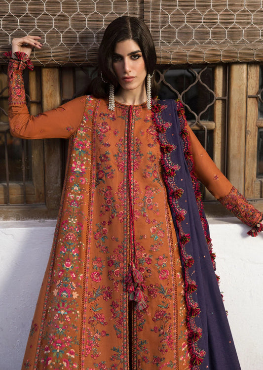 Model wearing Kamal from Hussain Rehar's Karandi AW '24, showcasing luxury Pakistani clothes online in UK.