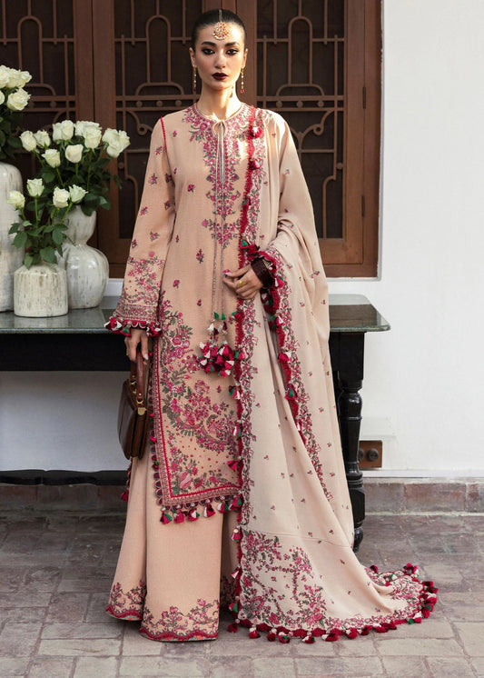 Model wearing Lali from Hussain Rehar's Karandi AW '24, showcasing luxury Pakistani clothes online in UK.