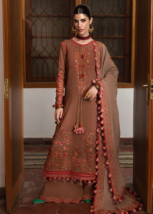 Model wearing Shay from Hussain Rehar's Karandi AW '24, showcasing luxury Pakistani clothes online in UK.